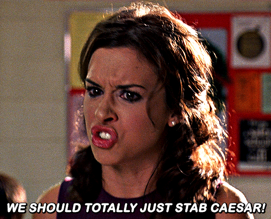 Lacey Chabert as Gretchen Wieners from Mean Girls is angry and shouting "We should totally just stab Caesar!"