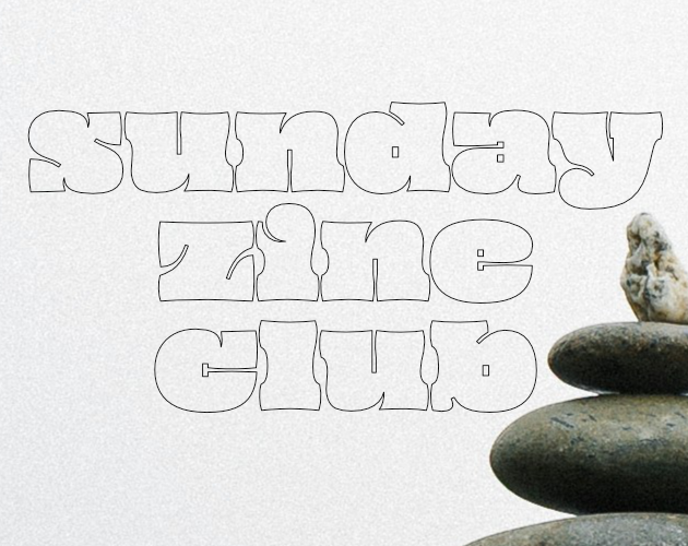 closeup of a stack of rounded rocks, cropped in the lower right. the words on top of the image read sunday zine club